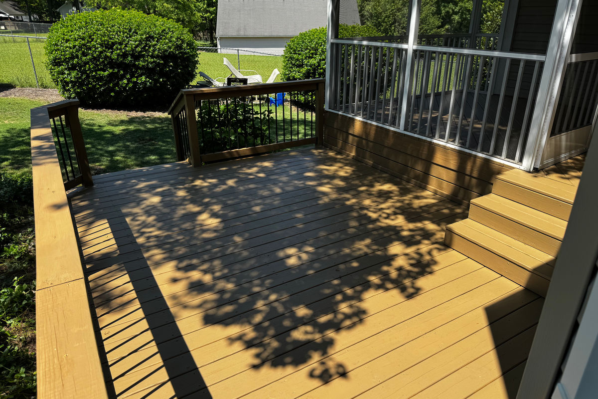 Stained deck railing and steps