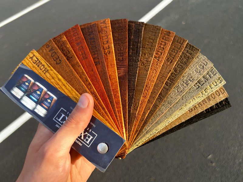 Fan deck of real wood stain color samples